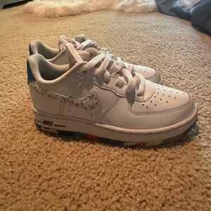 Nike Kids White Sneakers with Blue and Multicolor Accents